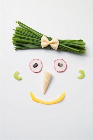 Amusing face made from vegetables baby corn cob & chives Stock Photo - Premium Royalty-Free, Code: 659-02212999