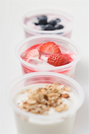 simsearch:659-02213333,k - Three yoghurts with berries and cereal Foto de stock - Sin royalties Premium, Código: 659-02213221