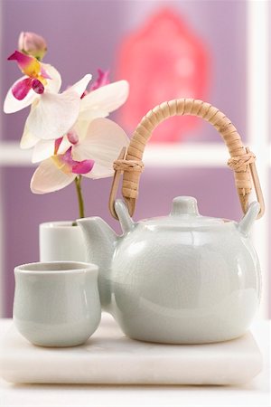 Teapot, tea bowl and orchid Stock Photo - Premium Royalty-Free, Code: 659-02213249