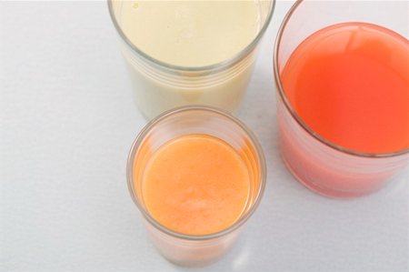 Three different juices in glasses (overhead view) Stock Photo - Premium Royalty-Free, Code: 659-02213291