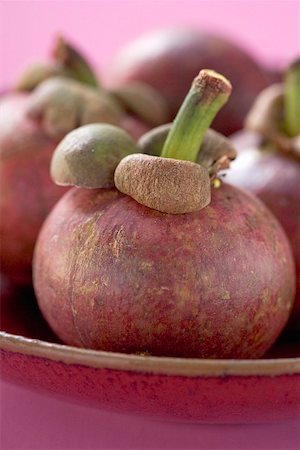 Mangosteens in bowl (detail) Stock Photo - Premium Royalty-Free, Code: 659-02213420