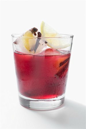 simsearch:659-03529205,k - Red wine punch in glass with ice cubes and lemon Stock Photo - Premium Royalty-Free, Code: 659-02213493