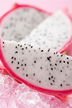 simsearch:659-02213517,k - Wedges of pitahaya on crushed ice Stock Photo - Premium Royalty-Free, Code: 659-02213529