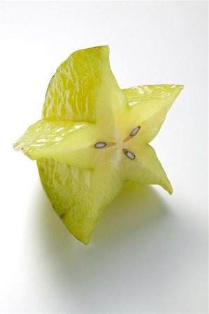 simsearch:659-02213511,k - Carambola, halved Foto de stock - Royalty Free Premium, Número: 659-02213579