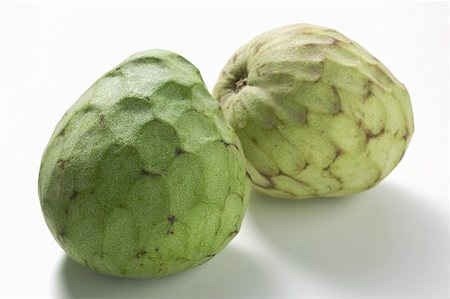 simsearch:659-02213610,k - Two cherimoyas Stock Photo - Premium Royalty-Free, Code: 659-02213617