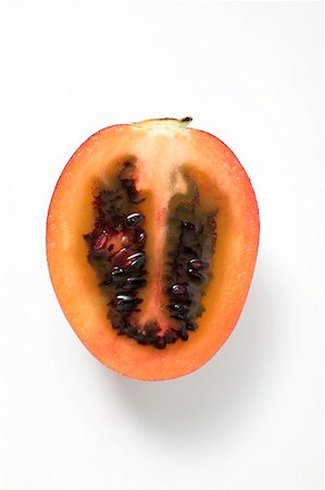 simsearch:659-02213612,k - Half a tamarillo (overhead view) Stock Photo - Premium Royalty-Free, Code: 659-02213635