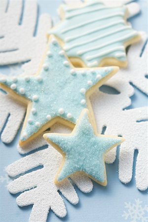 star cookie - Three star biscuits with blue icing Stock Photo - Premium Royalty-Free, Code: 659-02213648