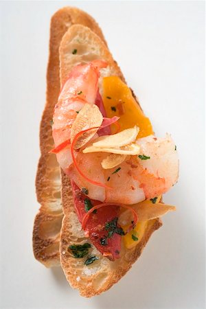 Garlic prawns on crostini Foto de stock - Sin royalties Premium, Código: 659-02213706