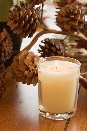 pine cone closeup - Christmas table decoration: candle and pine cones Stock Photo - Premium Royalty-Free, Code: 659-02213725