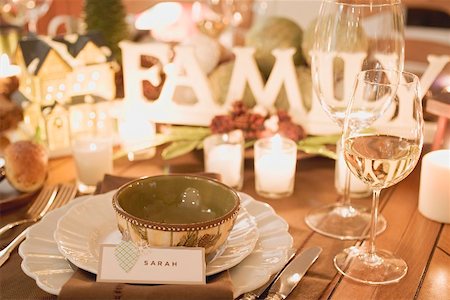 Christmas place-setting with place card, wine glasses Stock Photo - Premium Royalty-Free, Code: 659-02213798