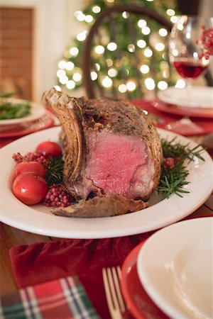 roast beef (cut of beef suitable for roasting) - Roast rib of beef on Christmas table Stock Photo - Premium Royalty-Free, Code: 659-02213790