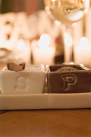 Salt and pepper in small dishes on Christmas table Stock Photo - Premium Royalty-Free, Code: 659-02213803