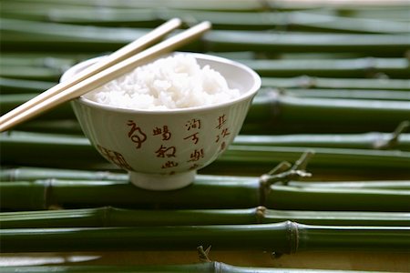 simsearch:659-03527071,k - Rice in Asian bowl with chopsticks Stock Photo - Premium Royalty-Free, Code: 659-02213913