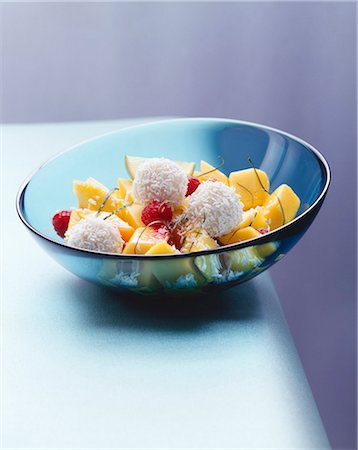 Mango salad with raspberries and coconut balls Stock Photo - Premium Royalty-Free, Code: 659-03524045