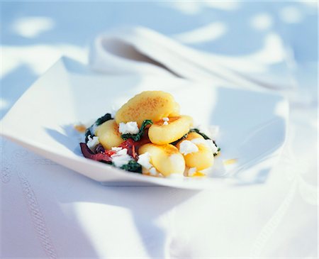 feta - Gnocchi with olives, spinach and feta Stock Photo - Premium Royalty-Free, Code: 659-03524088