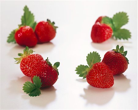 strawberry silo - Strawberries with leaves Stock Photo - Premium Royalty-Free, Code: 659-03524143