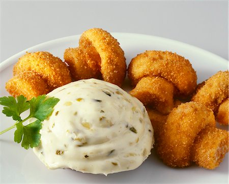deep fried - Breaded fried mushrooms with remoulade sauce Stock Photo - Premium Royalty-Free, Code: 659-03524236