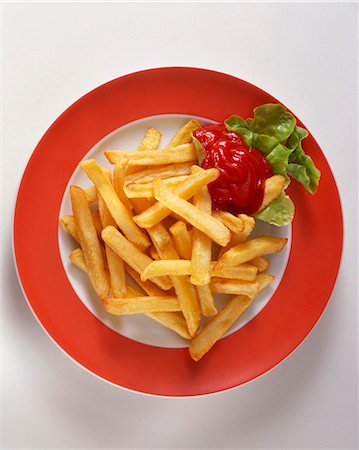 potato top view - A plate of chips with ketchup Stock Photo - Premium Royalty-Free, Code: 659-03524233