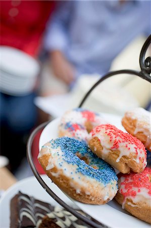 Doughnuts and brownies on tiered stand (4th of July, USA) Stock Photo - Premium Royalty-Free, Code: 659-03524361