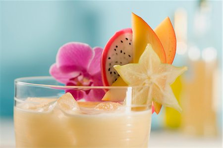 summer drink - Mango lassi with fresh fruit (detail) Stock Photo - Premium Royalty-Free, Code: 659-03524425