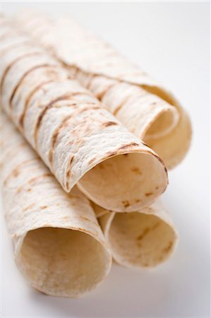 Unfilled tortilla rolls Fotografie stock - Premium Royalty-Free, Codice: 659-03524472