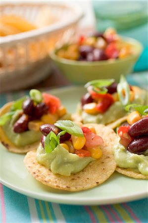 Tortilla chips with guacamole and salsa Stock Photo - Premium Royalty-Free, Code: 659-03524506