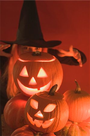 Pumpkin lanterns and witch for Halloween Stock Photo - Premium Royalty-Free, Code: 659-03524644