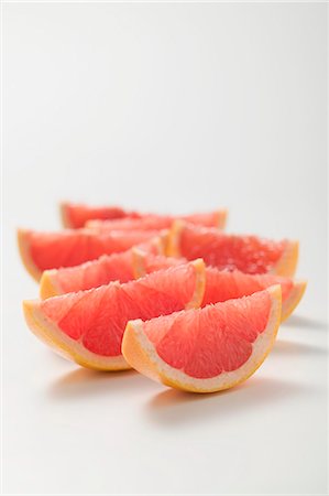 Wedges of pink grapefruit Stock Photo - Premium Royalty-Free, Code: 659-03524727