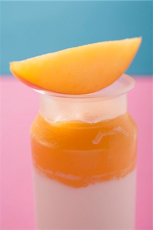 simsearch:659-02213540,k - Mango yoghurt with wedge of mango Stock Photo - Premium Royalty-Free, Code: 659-03524870