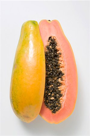 Papaya, halved Stock Photo - Premium Royalty-Free, Code: 659-03524895