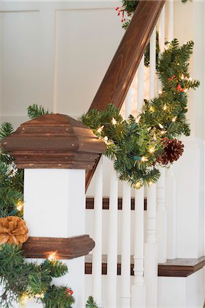 stairs closeup - Artistic fir garland on banister rail Stock Photo - Premium Royalty-Free, Code: 659-03524937