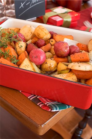 Roasted root vegetables on Christmas table (USA) Stock Photo - Premium Royalty-Free, Code: 659-03524942