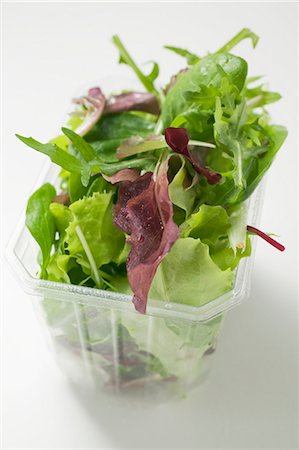 Mixed salad leaves in plastic container Stock Photo - Premium Royalty-Free, Code: 659-03524959