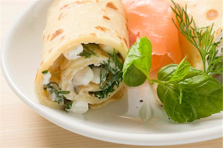 salmon roll - Pancake with soft cheese, smoked salmon and herbs Stock Photo - Premium Royalty-Free, Code: 659-03525159