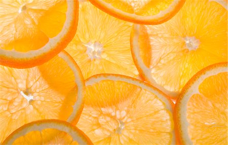 fruit backlit nobody - Orange slices (full-frame) Stock Photo - Premium Royalty-Free, Code: 659-03525333