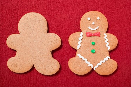 decorated cookies - Two gingerbread men, plain and decorated Stock Photo - Premium Royalty-Free, Code: 659-03525363