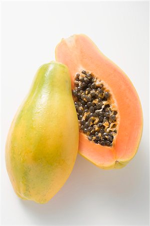 Papaya, halved Stock Photo - Premium Royalty-Free, Code: 659-03525517