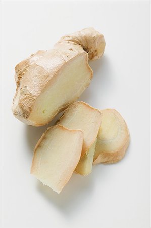 simsearch:659-03531505,k - Ginger root, partly sliced Foto de stock - Royalty Free Premium, Número: 659-03525681