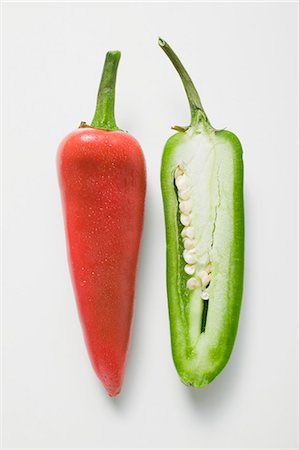 Whole red chilli and half a green chilli Stock Photo - Premium Royalty-Free, Code: 659-03525702