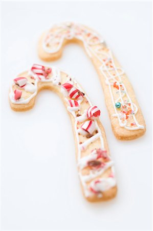 simsearch:659-01844431,k - Two Christmas biscuits in the shape of candy canes Stock Photo - Premium Royalty-Free, Code: 659-03525736