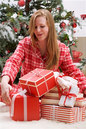 simsearch:659-03533706,k - Woman delighted with her Christmas gifts Stock Photo - Premium Royalty-Free, Code: 659-03525847