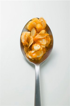 squash seeds - Pumpkin seeds on spoon (overhead view) Stock Photo - Premium Royalty-Free, Code: 659-03526034