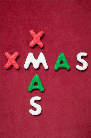 Le mot Noël sur fond rouge Photographie de stock - Premium Libres de Droits, Code: 659-03526505