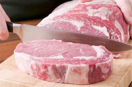 steak knife - Slicing beef Stock Photo - Premium Royalty-Free, Code: 659-03526529