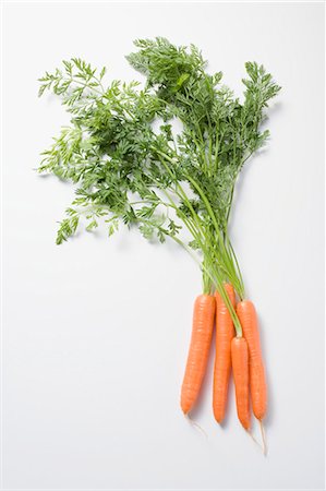 Fresh carrots with tops Stock Photo - Premium Royalty-Free, Code: 659-03526740