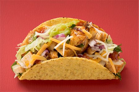 simsearch:659-03526914,k - Chicken taco (red background) Stock Photo - Premium Royalty-Free, Code: 659-03526846