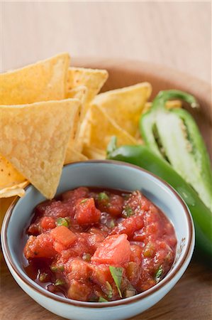 Tomato salsa, nachos and fresh chilli Stock Photo - Premium Royalty-Free, Code: 659-03526917