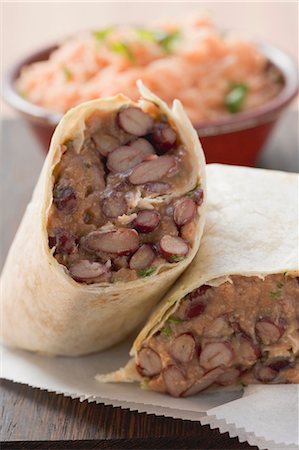 simsearch:659-03526914,k - Bean burritos, tomato rice in background Stock Photo - Premium Royalty-Free, Code: 659-03526950