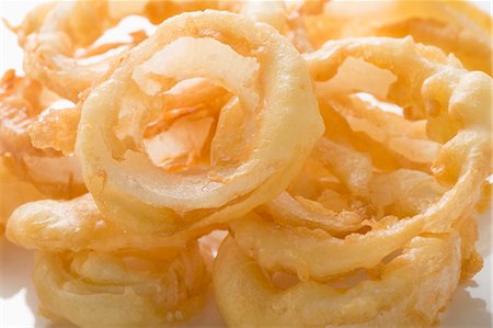 Deep-fried onion rings Foto de stock - Sin royalties Premium, Código: 659-03526995