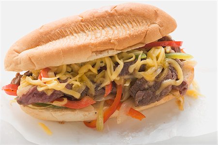 sub sandwich - Steak sandwich with peppers and cheese Stock Photo - Premium Royalty-Free, Code: 659-03527021